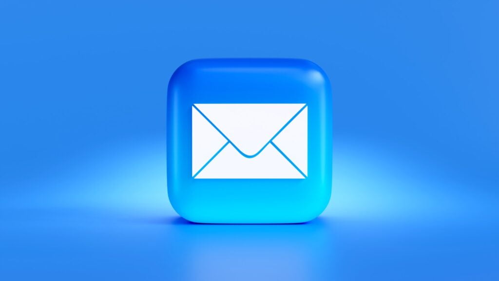 a blue button with a white envelope on it-Email Campaigns