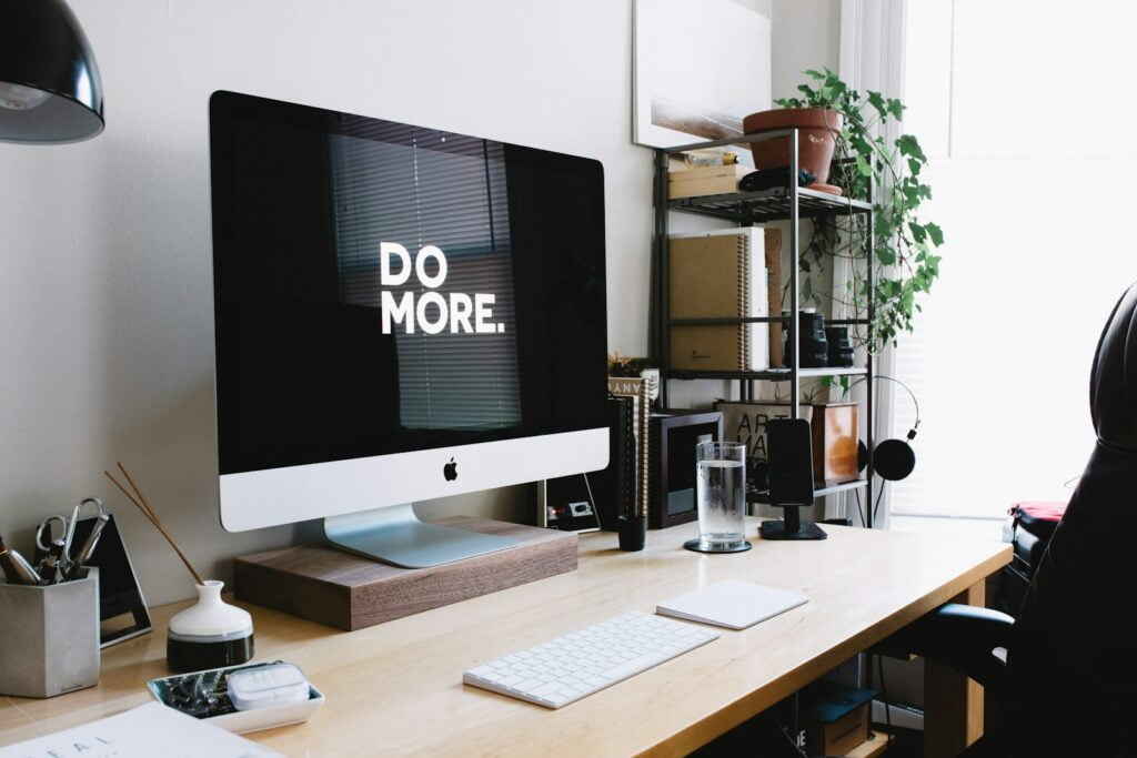 silver iMac with keyboard and trackpad inside room-Email Marketing Courses