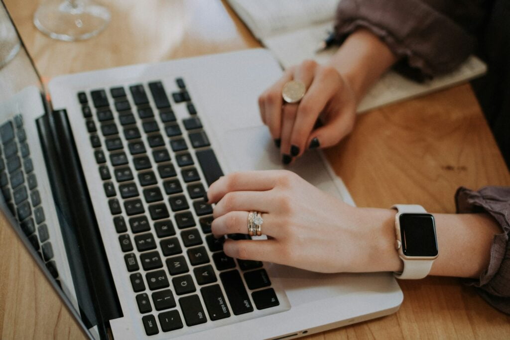 person using MacBook-Best Free Business Email Platforms Without a Domain